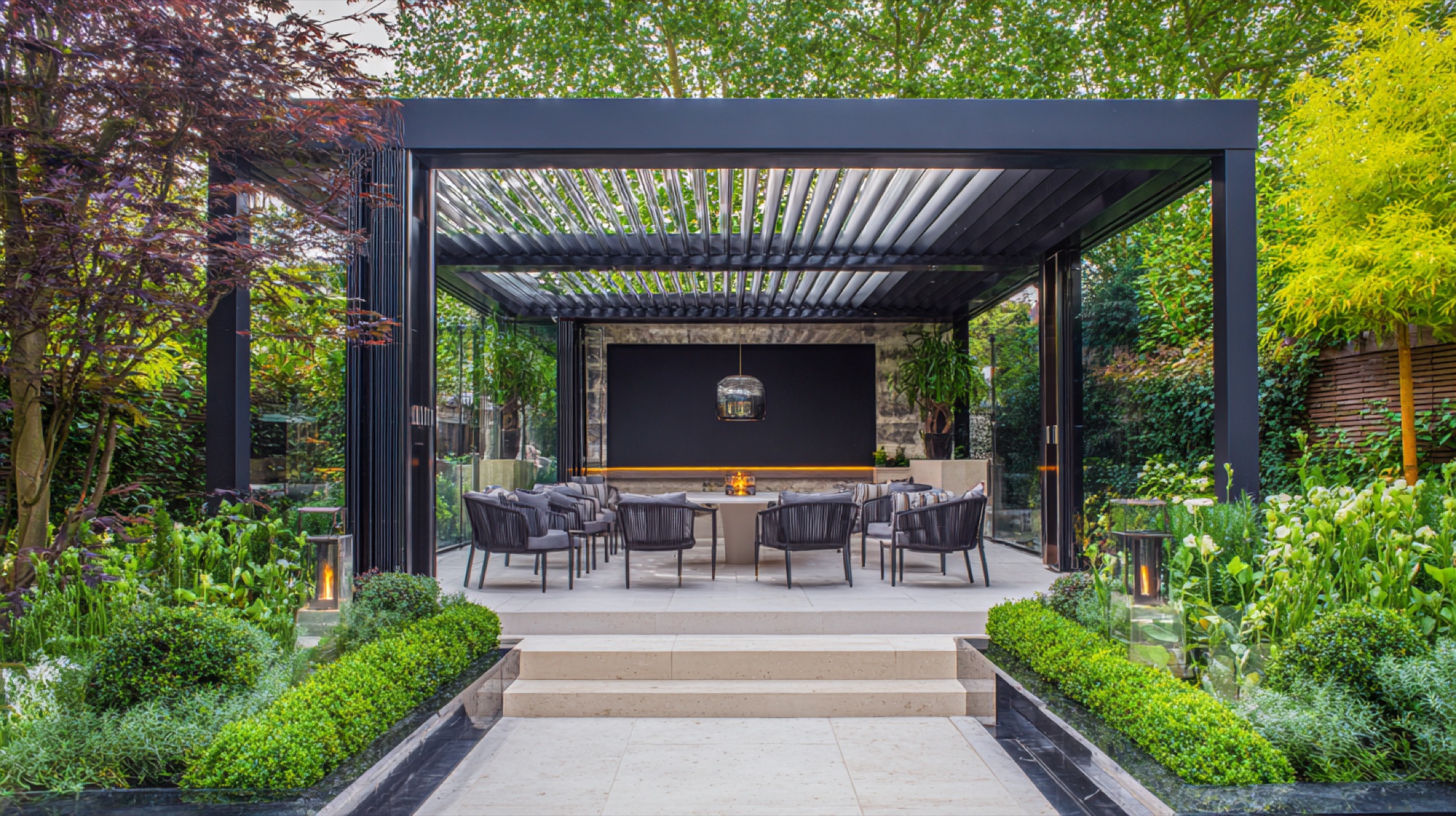 Bespoke pergola, decking, and landscaping in a luxury London garden
